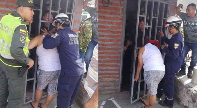 Mujer queda atrapada en una reja por espiar lo que hacía su vecina