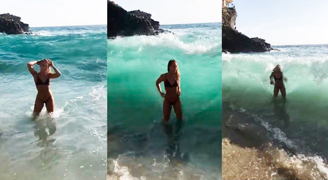 Chica busca tomarse una foto sensual pero el mar le arruina todos sus planes (Video)